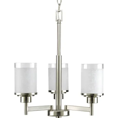 Three-light chandelier features a pleasingly simple Brushed Nickel frame while visually interesting textured white linen glass are complemented by a crisp clear edge accent. Six fe...