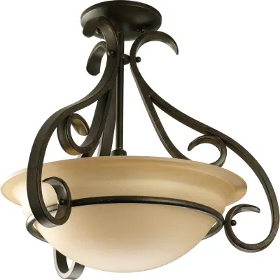 Three-light semi-flush with tea stained oversized, bell-shaped glass bowl. Distinctive ebbing and flowing of squared scrolls and arms in Forged Bronze finish. Chain and ceiling mou...