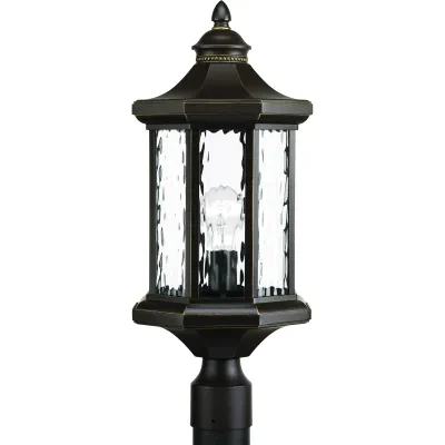 The one-light post lantern in the Edition collection features distinctive octagonal shape for classic styling. Clear water glass elements are accented by a Antique Bronze finish. D...