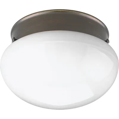 A traditional one-light close-to-ceiling fixture featuring a White glass bowl and an Antique Bronze finish. The fixture is ideal in a bathroom setting or hall/foyer.