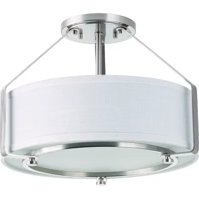 The three-light semi-flush offers a sleek metal frame that supports a low-slung shade to create Ratio�s casual modern style. The frame�s proportion to the white linen drum shade ev...