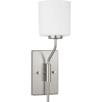 A modern take on a classic object, Tobin�s inspiration comes from the timeless mid-century forms. The tubular arms of the one-light wall bracket extend outward and are made to form...
