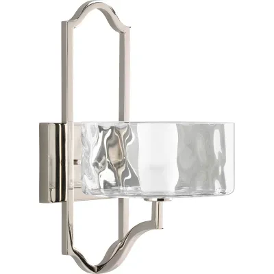 One-light wall sconce. Caress features a chic, sophisticated one-light wall sconce featuring a Polished Nickel metal frame with layered glass diffusers to cast a glimmering light....