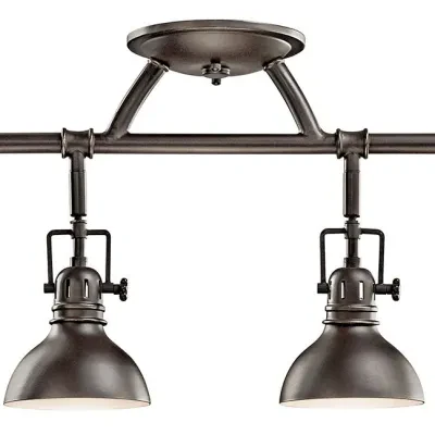 Constructed from steel, this refined 4 light fixed rail fixture features an Olde Bronze finish to subtly enhance any space.