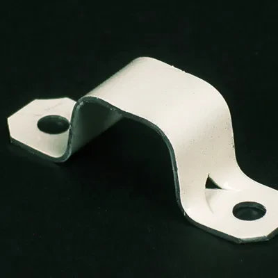 Converts to one hole by breaking off at score. Lanced tab holds strap in place while fastening to surface. Ivory.