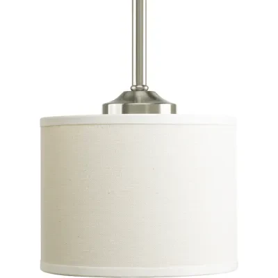 Harkening back to a simpler time, the Inspire Collection freshens traditional forms with flowing lines. This one-light mini-pendant features an off-white linen fabric shade and Bru...