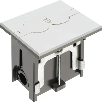 Non Metallic adjustable floor box. White with flip lids. Includes tamper resistant duplex receptacle, cover plate with gasket and Arlington NM94 connector and Arlington NM900 knock...